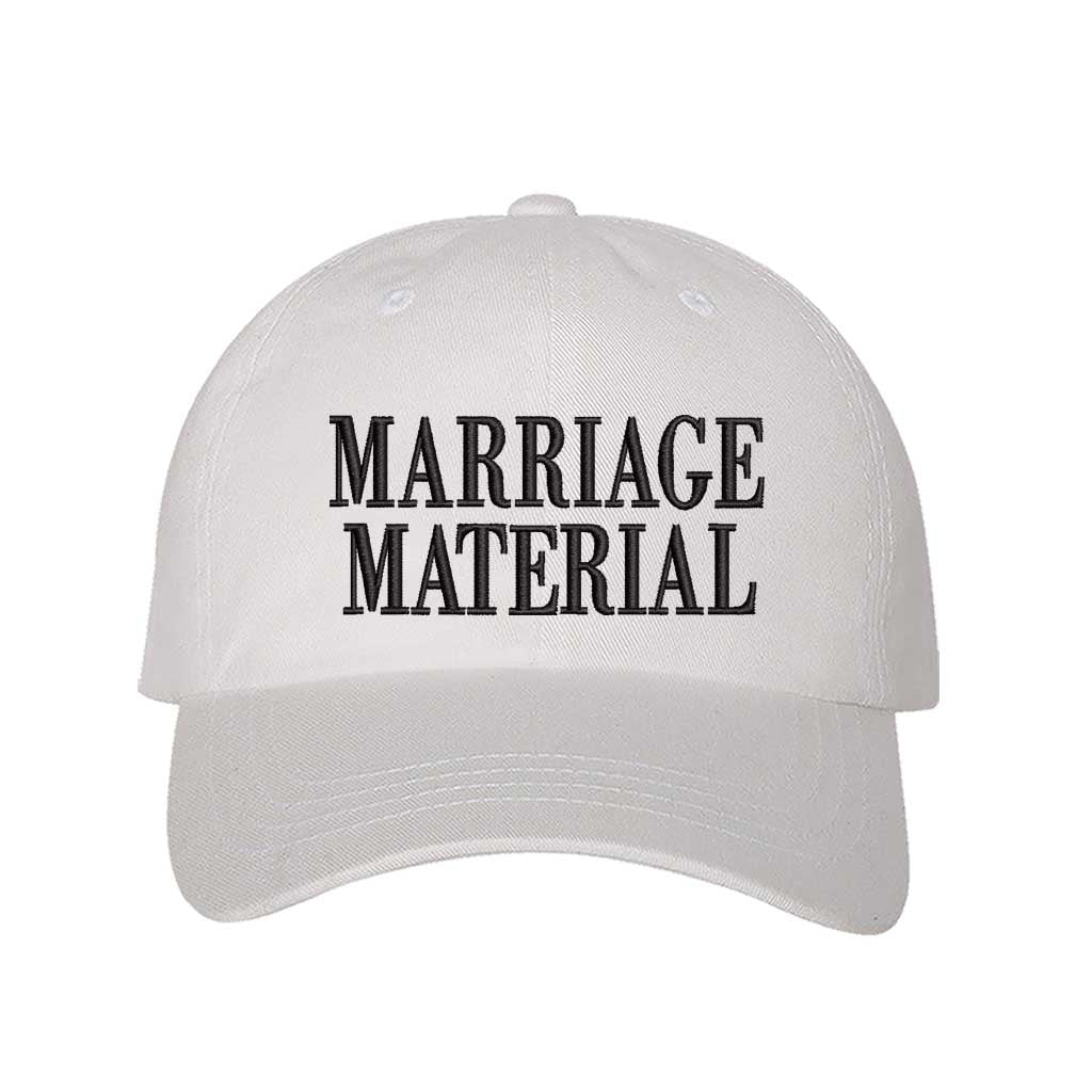 White Marriage Material Embroidered Baseball Hat in soft cotton with pre-curved brim and adjustable hook and loop closure. DSY Lifestyle.