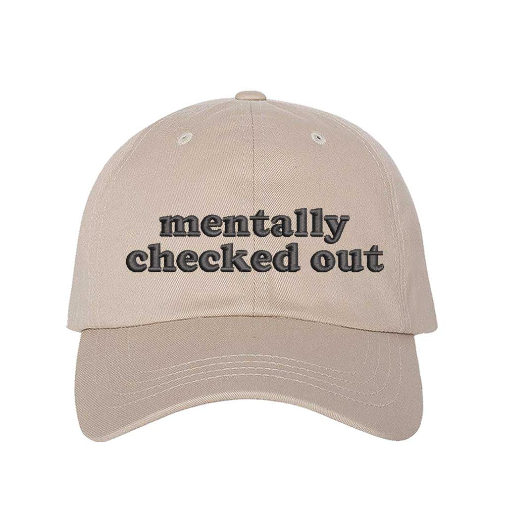 Stone cotton baseball hats with the phrase Mentally Checked Out embroidered black thread in a clean, modern font. - DSY Lifestyle