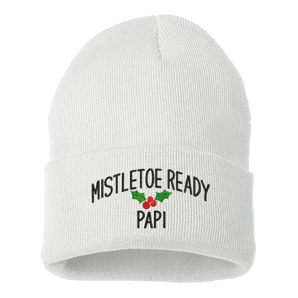 A cozy knit White beanie embroidered with "Mistletoe Ready, Papi," perfect for flirty Spanglish holiday vibes and festive winter outfits - DSY Lifestyle
