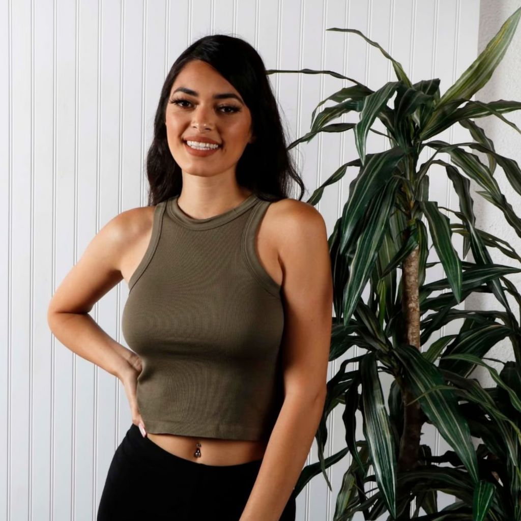 Women wearing a seamless thick fabric ribbed tank top in Olive color