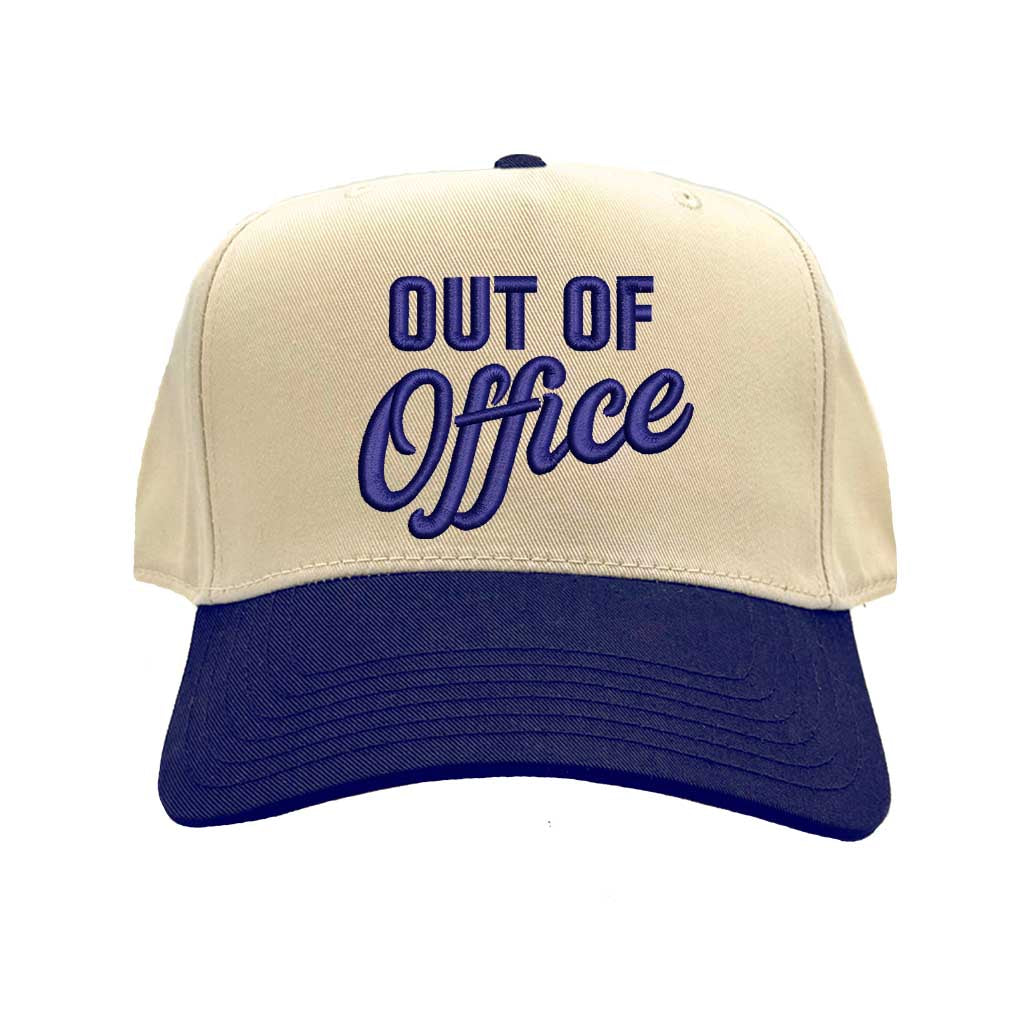Natural Navy Blue Two-tone Out of Office embroidered dad hat with white front panel and beige brim, featuring bold black text and adjustable strap. – DSY Lifestyle.