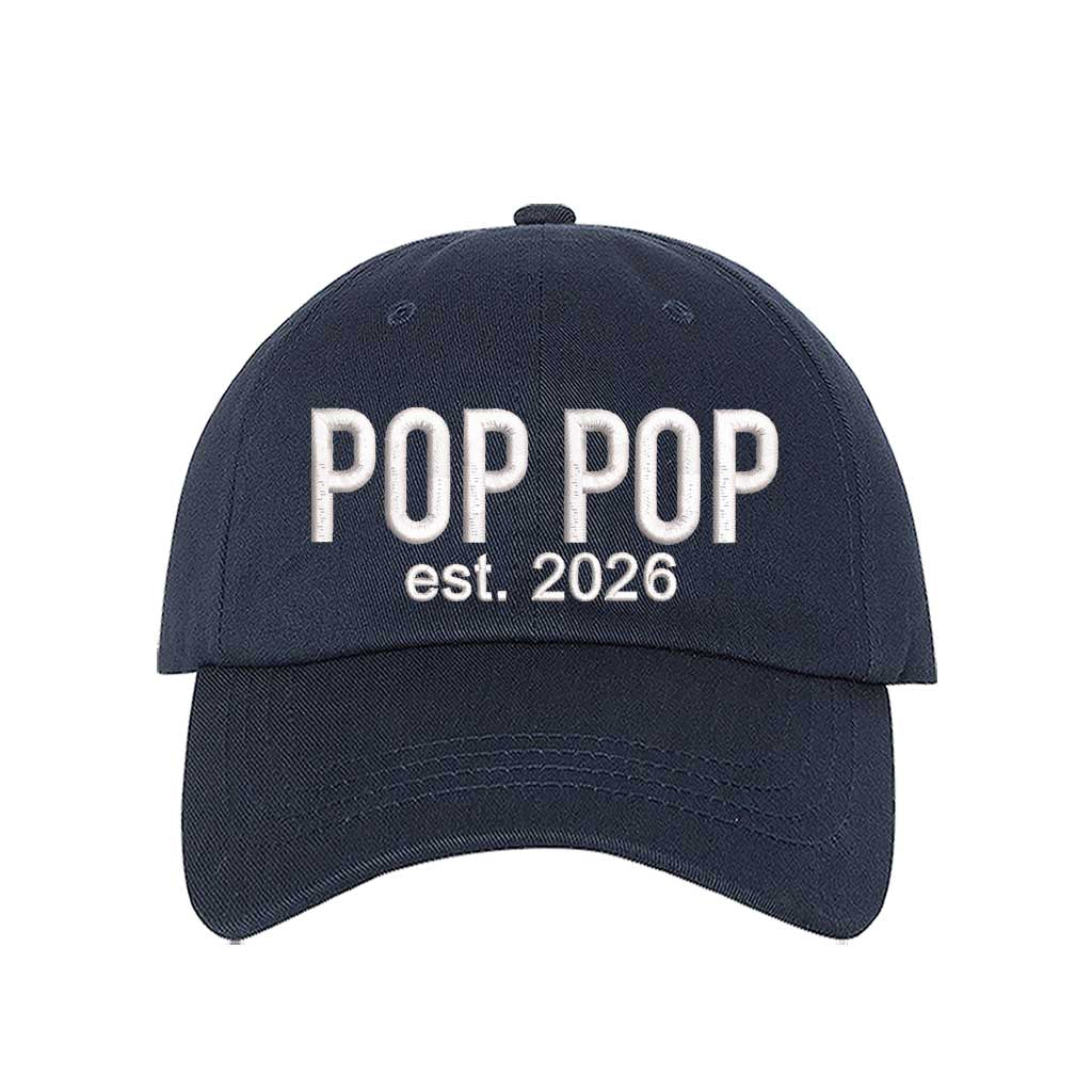 Navy Blue Pop Pop Est. 2026 Baseball Hat featuring bold white embroidery on a premium dad cap; a stylish 2026 announcement gift for new grandfathers by DSY Lifestyle.