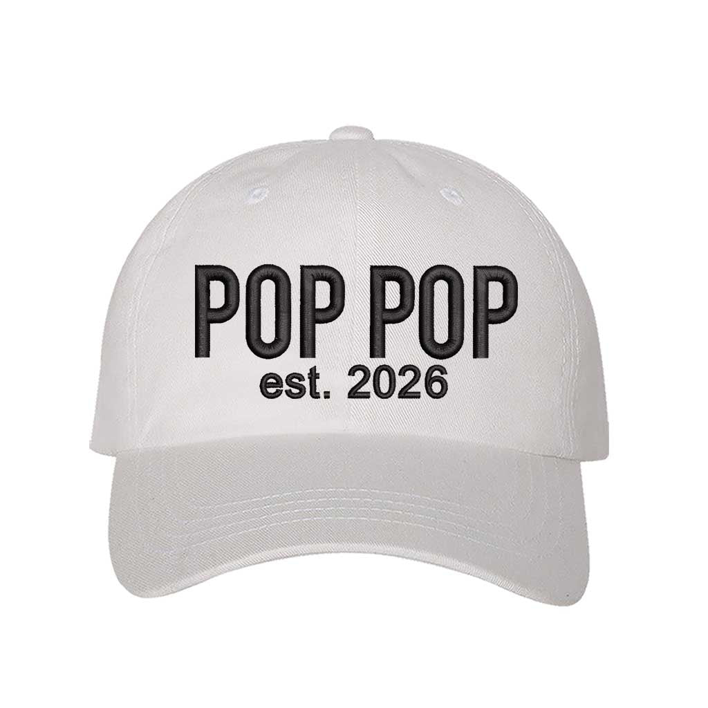 White Pop Pop Est. 2026 Baseball Hat featuring bold black embroidery on a premium dad cap; a stylish 2026 announcement gift for new grandfathers by DSY Lifestyle.