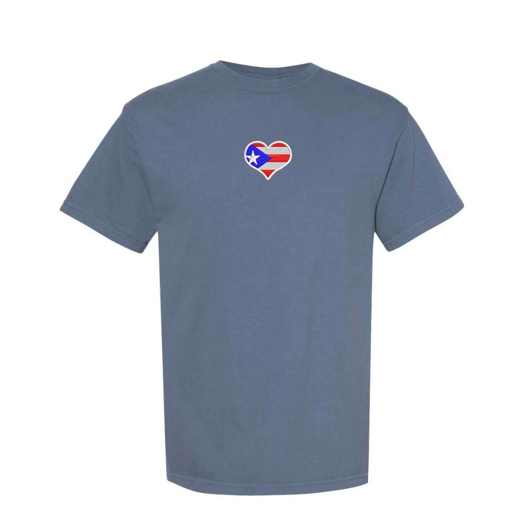 Flo Blue washed Comfort Colors t-shirt by DSY Lifestyle showcasing an embroidered heart with the Puerto Rican flag, centered on the chest.