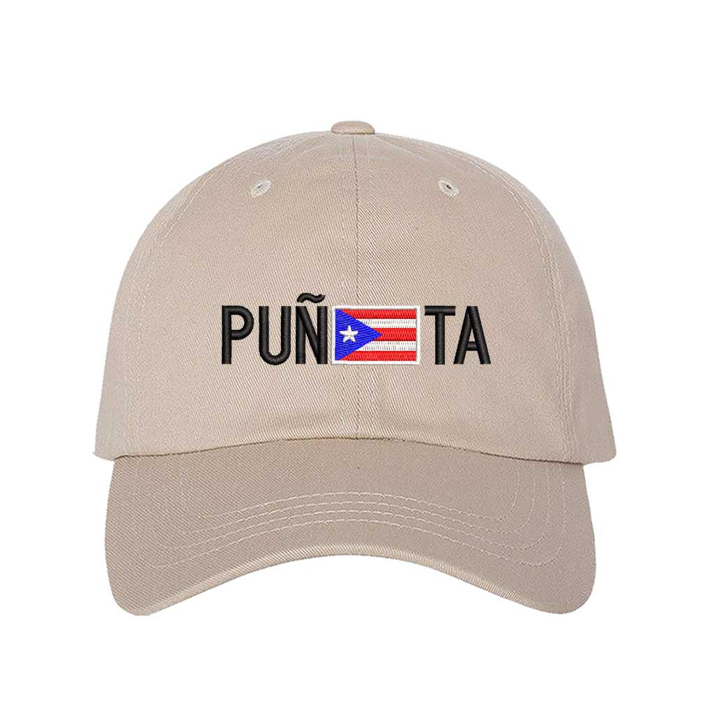 Stone embroidered baseball hat with "Puñeta" in bold lettering, featuring the Puerto Rican flag as the letter "E," representing Boricua pride and culture - DSY Lifestyle