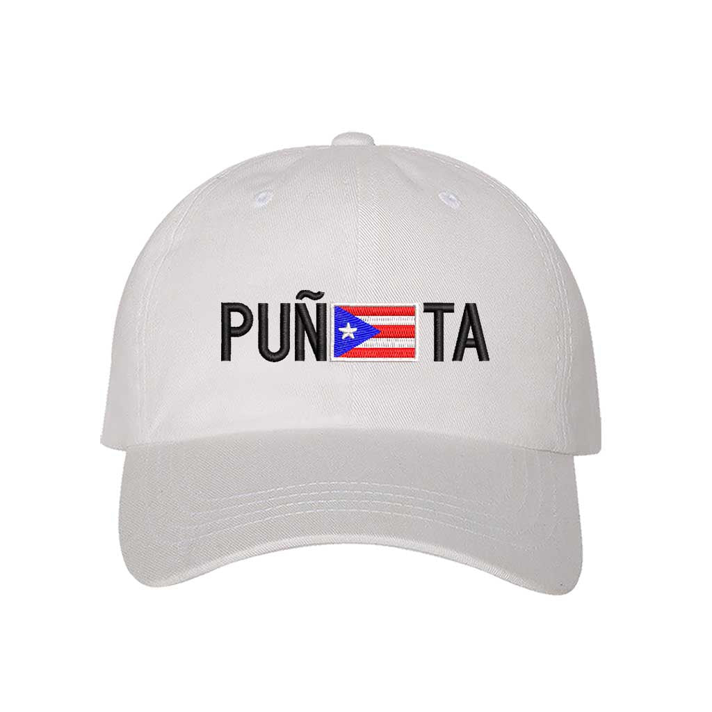 White embroidered baseball hat with "Puñeta" in bold lettering, featuring the Puerto Rican flag as the letter "E," representing Boricua pride and culture - DSY Lifestyle