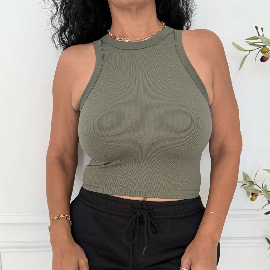 Close up of women wearing a seamless thick fabric ribbed tank top in Olive color
