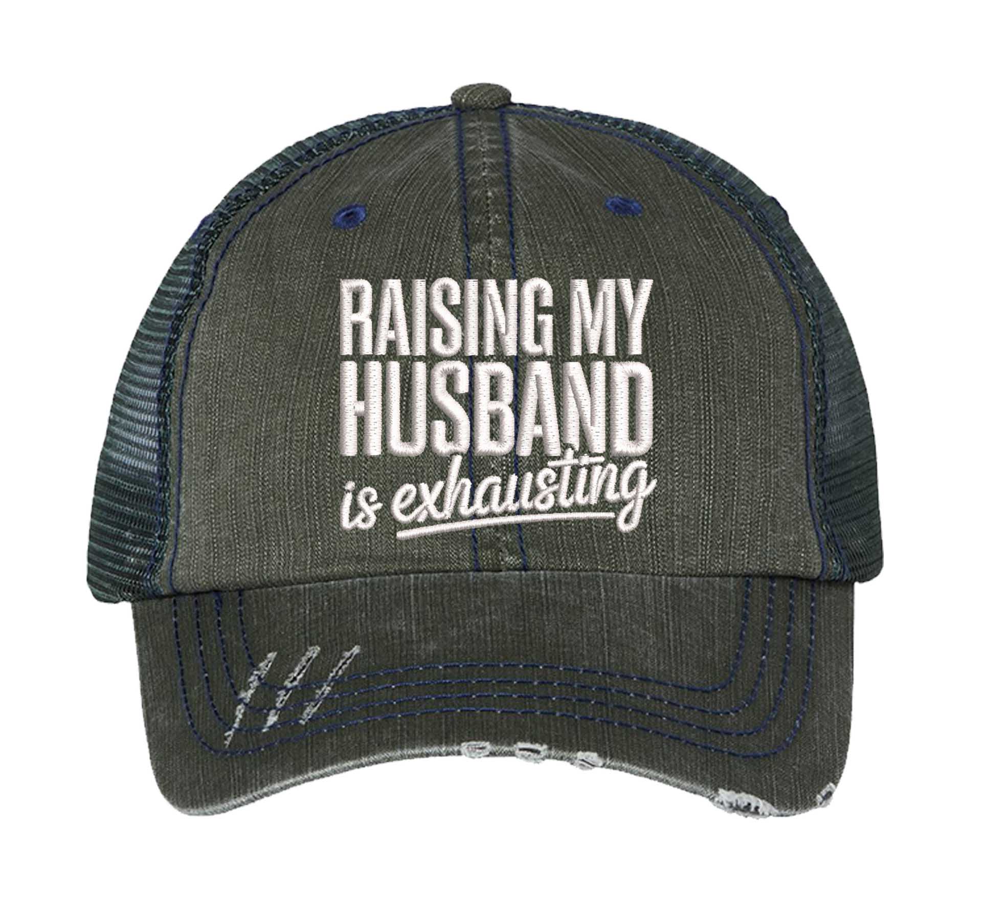 Dark Green DSY Lifestyle distressed trucker hat featuring the phrase Raising My Husband Is Exhausting in bold, professional embroidery. - DSY Lifestyle