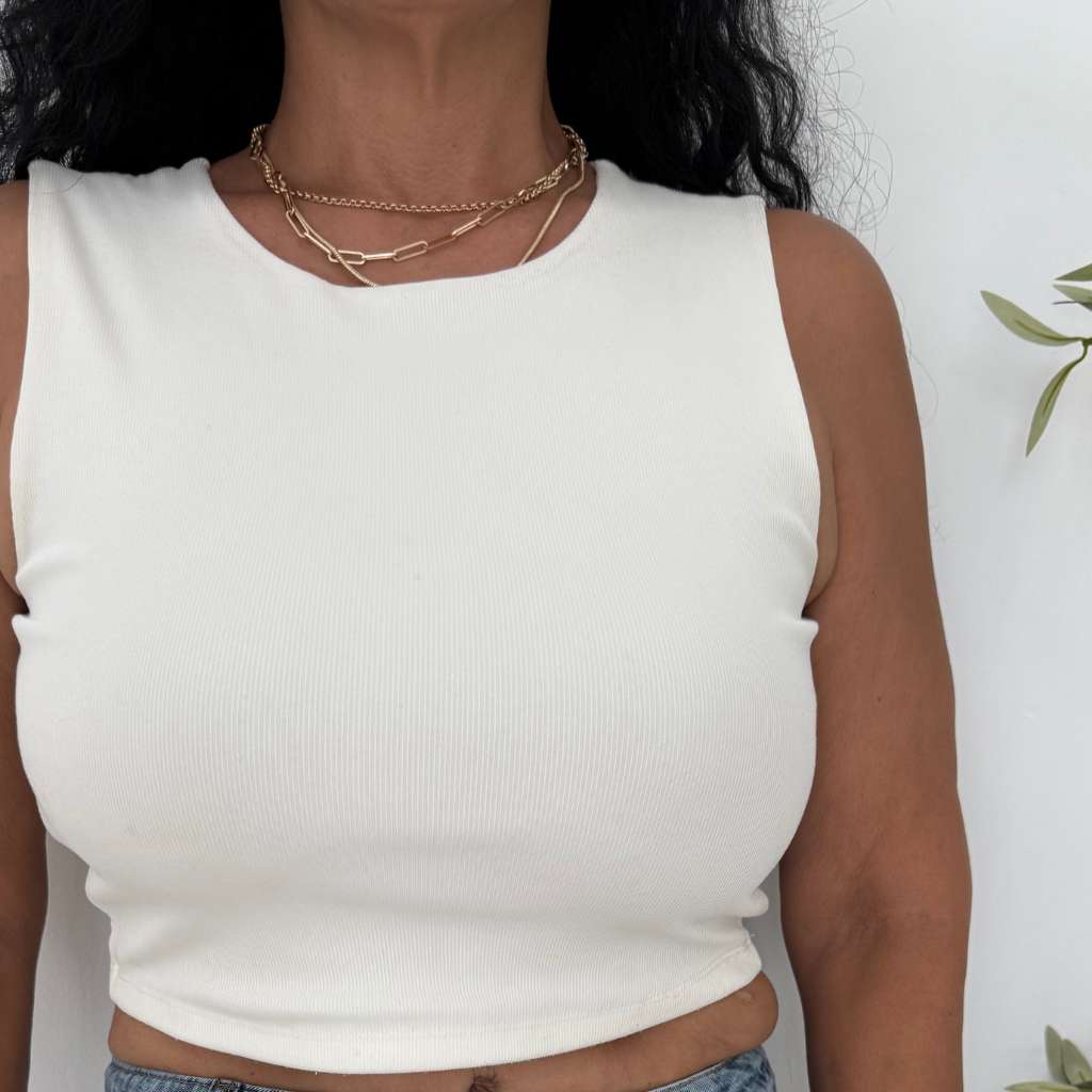 Woman wearing a Sleeveless Knit Crop Top in beige- DSY Lifestyle