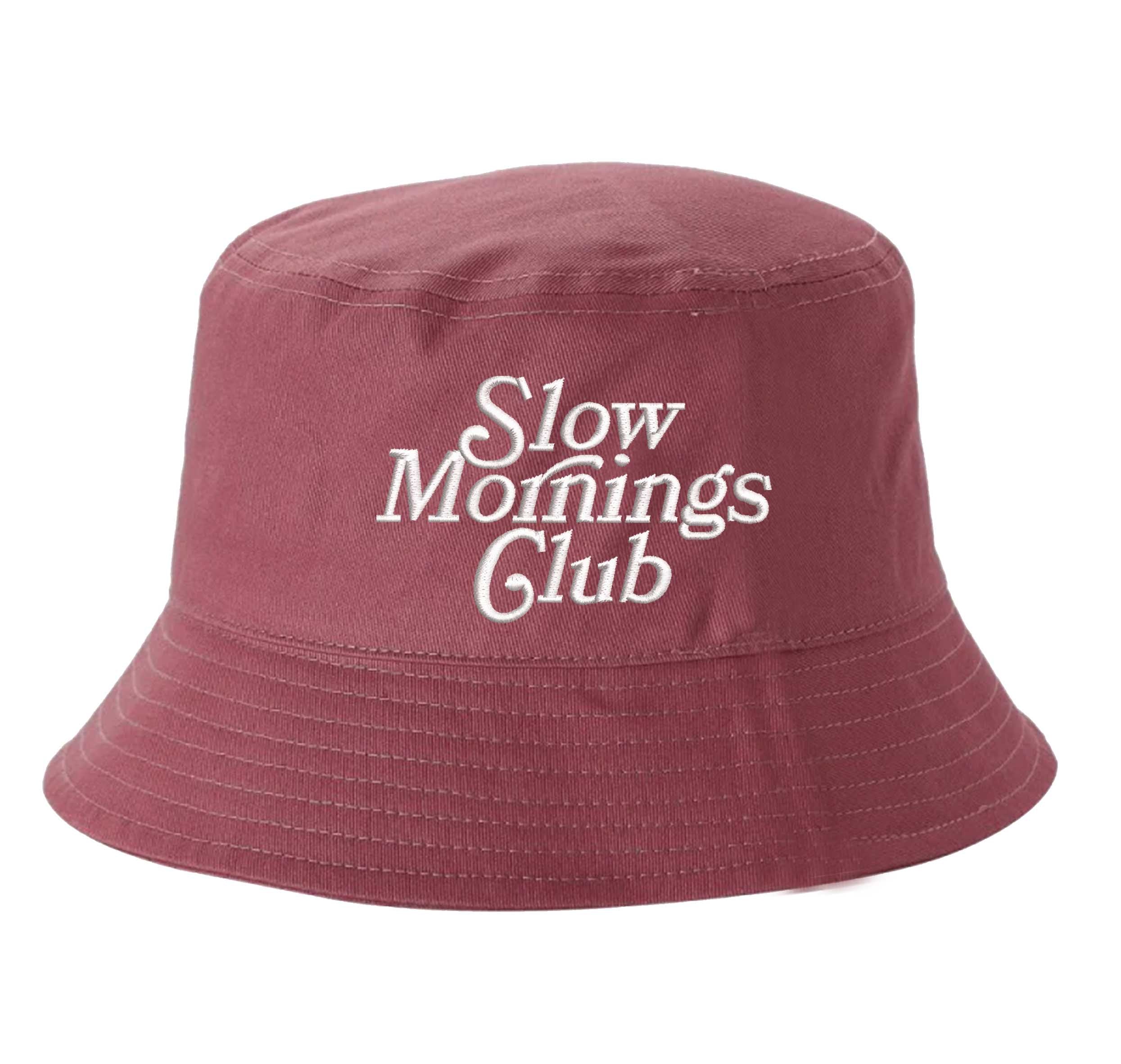 Mauve Front view of a classic cotton bucket hat featuring the phrase "Slow Morning" in high-density script embroidery. - DSY Lifestyle
