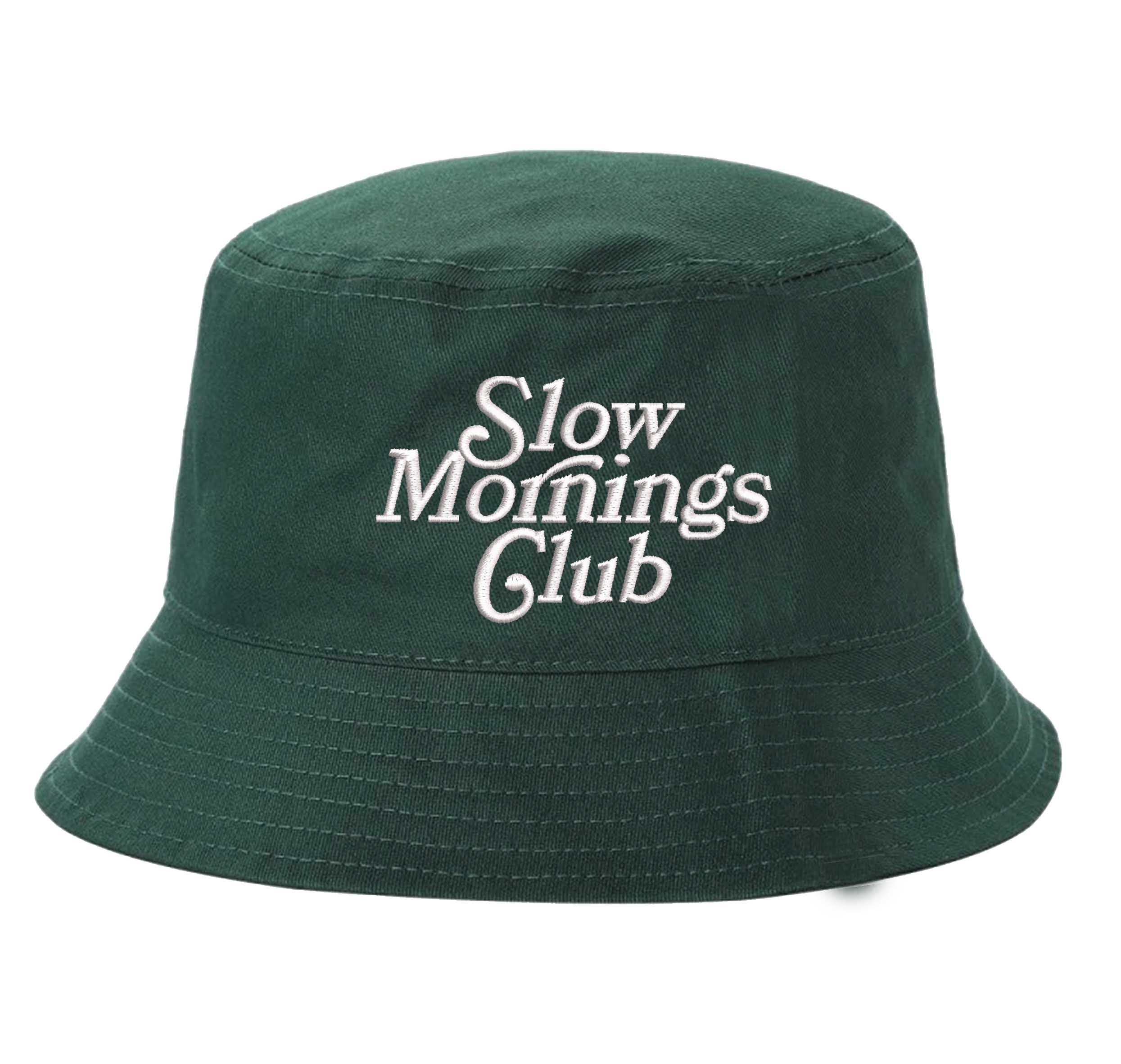 Forest Green Front view of a classic cotton bucket hat featuring the phrase "Slow Morning" in high-density script embroidery. - DSY Lifestyle