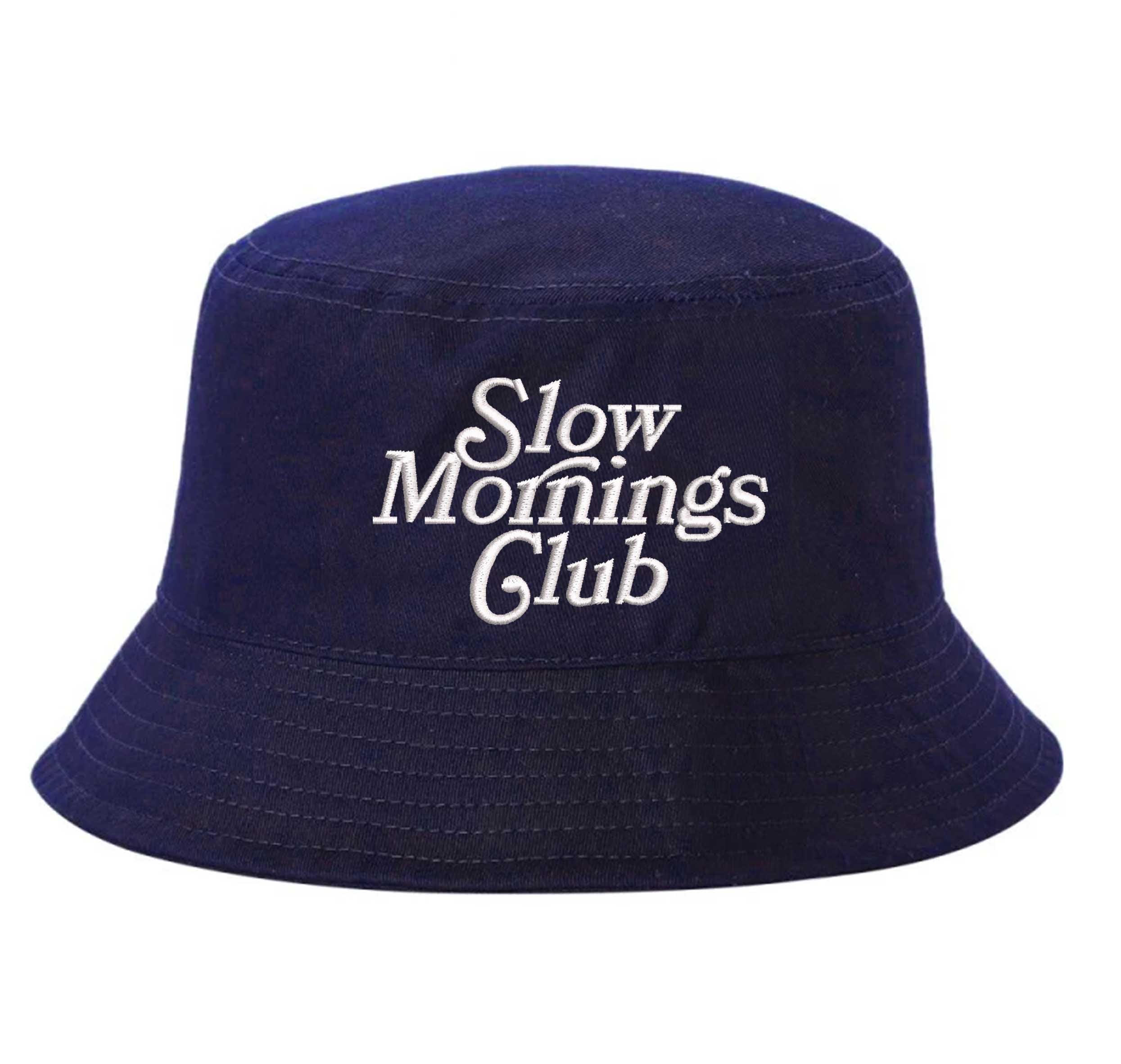 Navy Blue Front view of a classic cotton bucket hat featuring the phrase "Slow Morning" in high-density script embroidery. - DSY Lifestyle