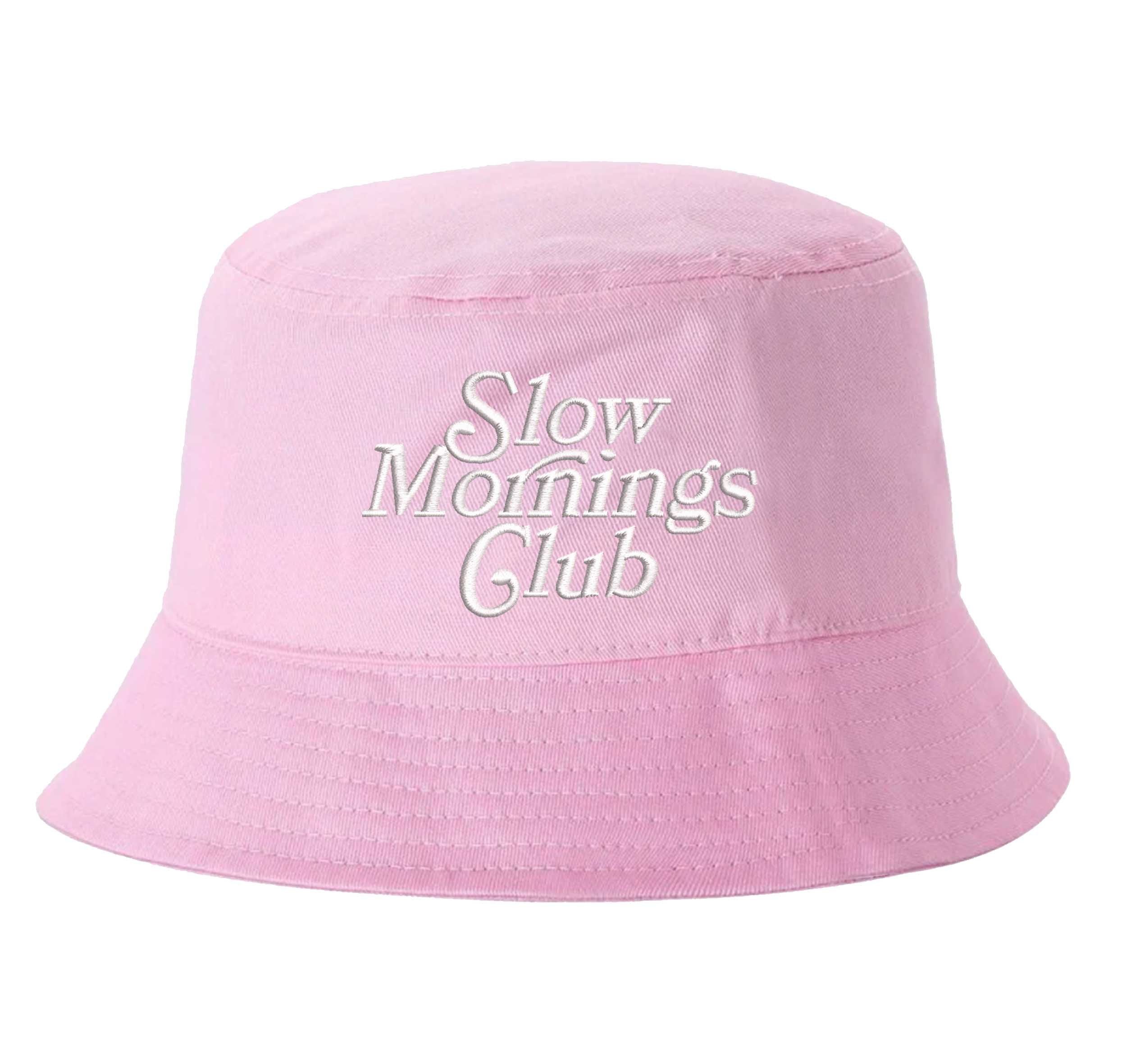 Light Pink Front view of a classic cotton bucket hat featuring the phrase "Slow Morning" in high-density script embroidery. - DSY Lifestyle