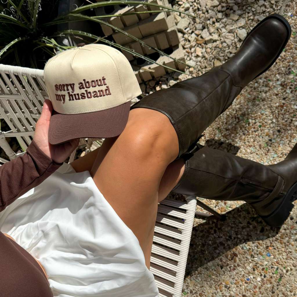 Casual outfit featuring the Sorry About My Husband baseball hat paired with a stylish look