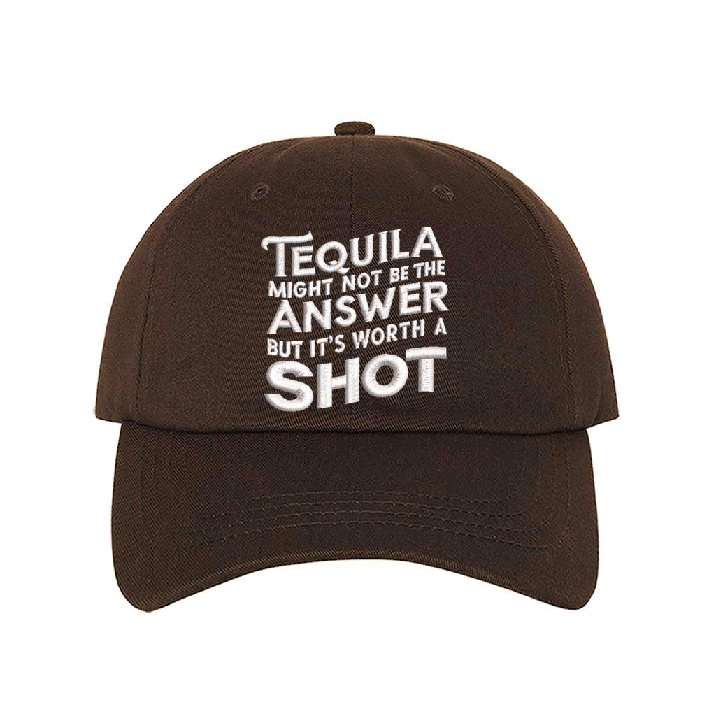 Brown Cotton baseball hat with “Tequila Might Not Be The Answer But It’s Worth A Shot” embroidered on the front, pre-curved brim, and adjustable strap. DSY Lifestyle.