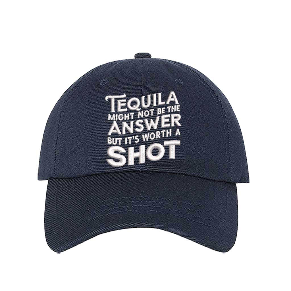 Navy Blue Cotton baseball hat with “Tequila Might Not Be The Answer But It’s Worth A Shot” embroidered on the front, pre-curved brim, and adjustable strap. DSY Lifestyle.