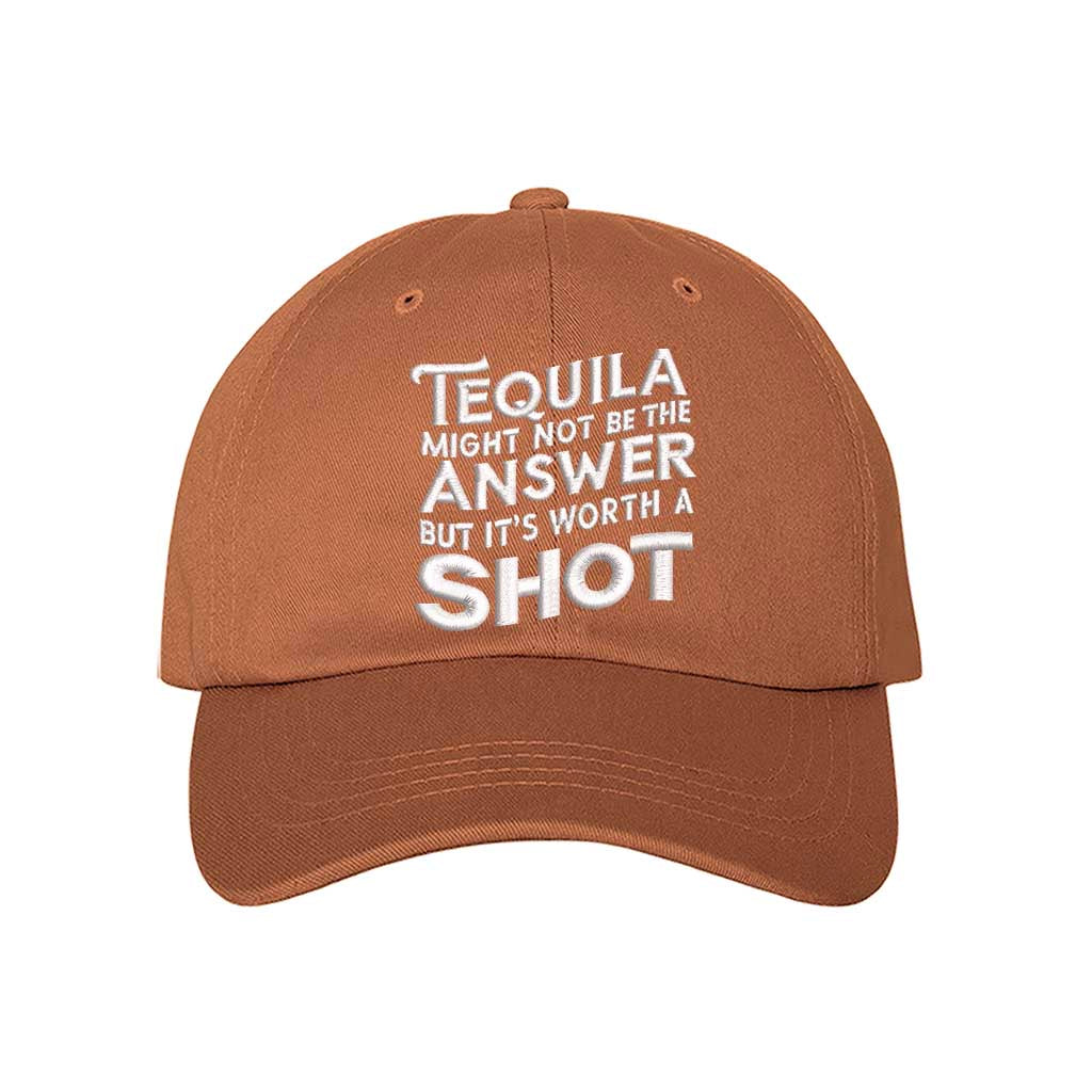 Texas Orange Cotton baseball hat with “Tequila Might Not Be The Answer But It’s Worth A Shot” embroidered on the front, pre-curved brim, and adjustable strap. DSY Lifestyle.
