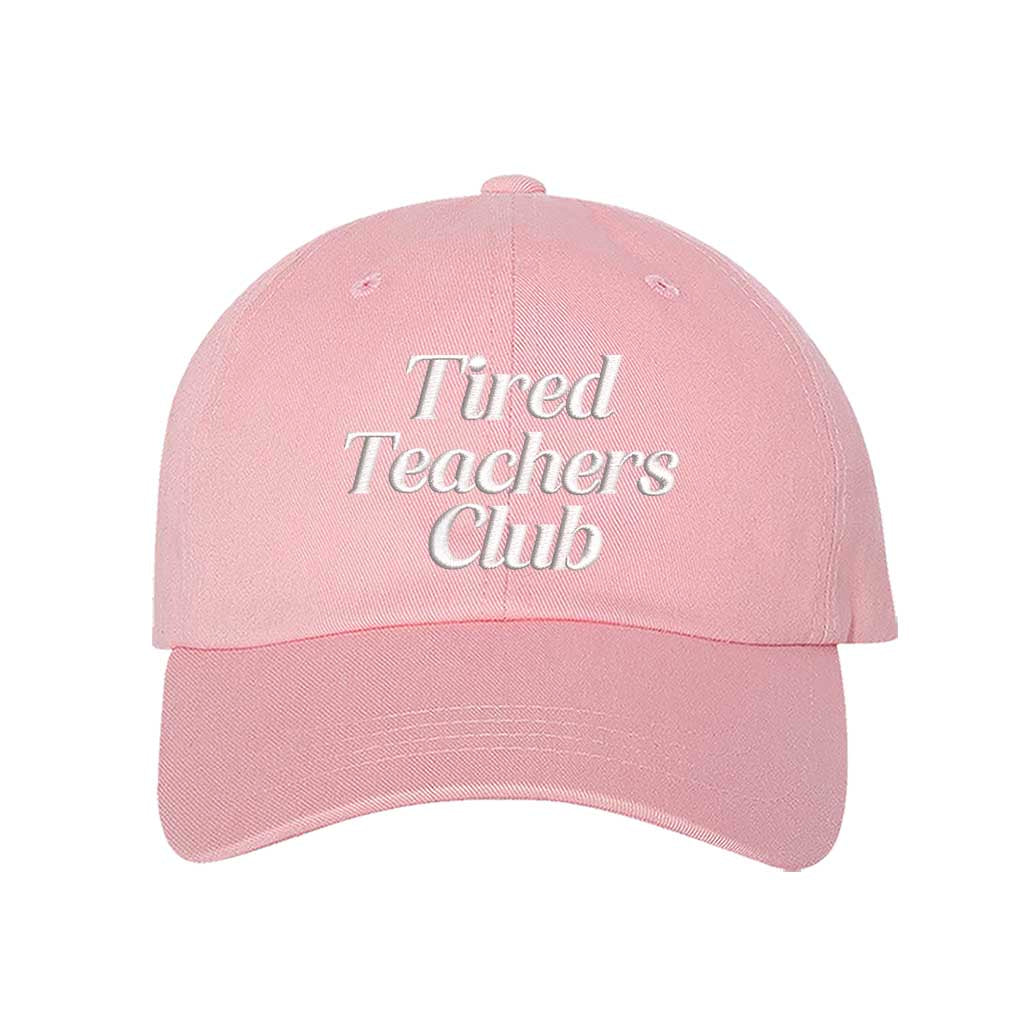 Lights Pink DSY Lifestyle cotton baseball hat featuring the phrase Tired Teacher Club in bold, detailed professional embroidery. - DSY Lifestyle