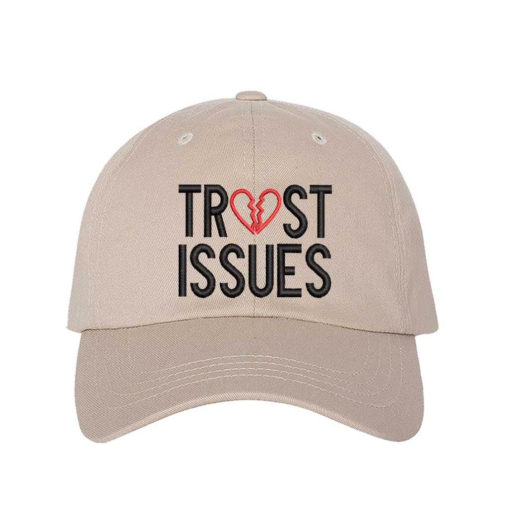 Stone Trust Issues Baseball Hat featuring "Trust Issues" embroidered in a bold font on a classic dad cap; a funny and relatable statement accessory from DSY Lifestyle.
