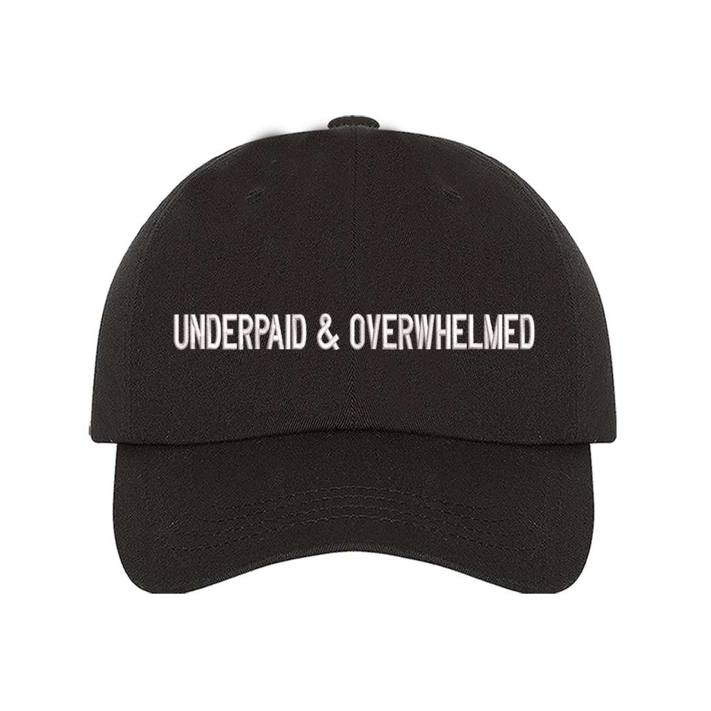 Black baseball hat with the phrase underpaid & overwhelmed embroidered on it-DSY Lifestyle