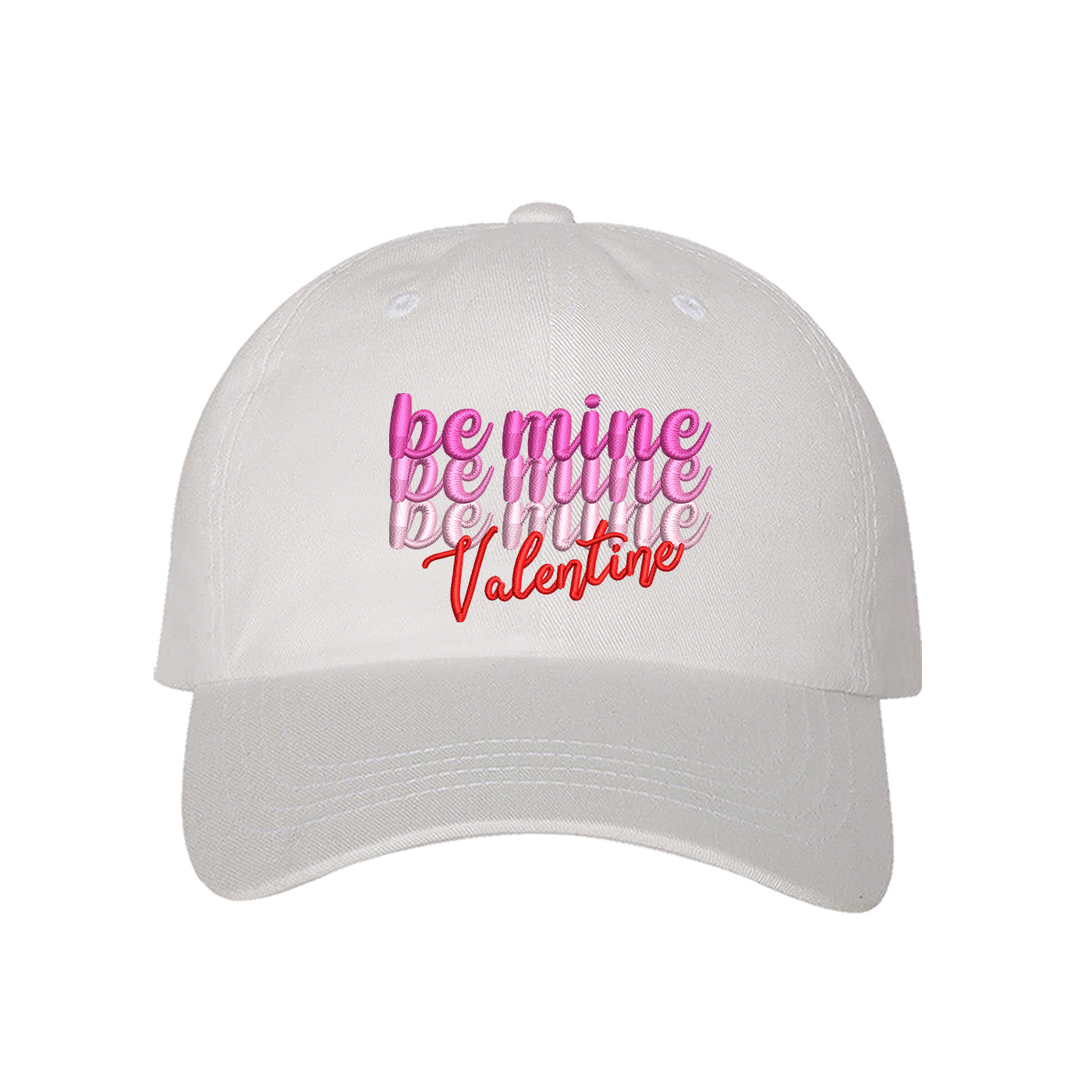 White Be Mine Valentines Baseball Hat with "Be Mine" stacked embroidered on a classic dad cap, a romantic and giftable accessory from the DSY Lifestyle Valentines Day Collection.