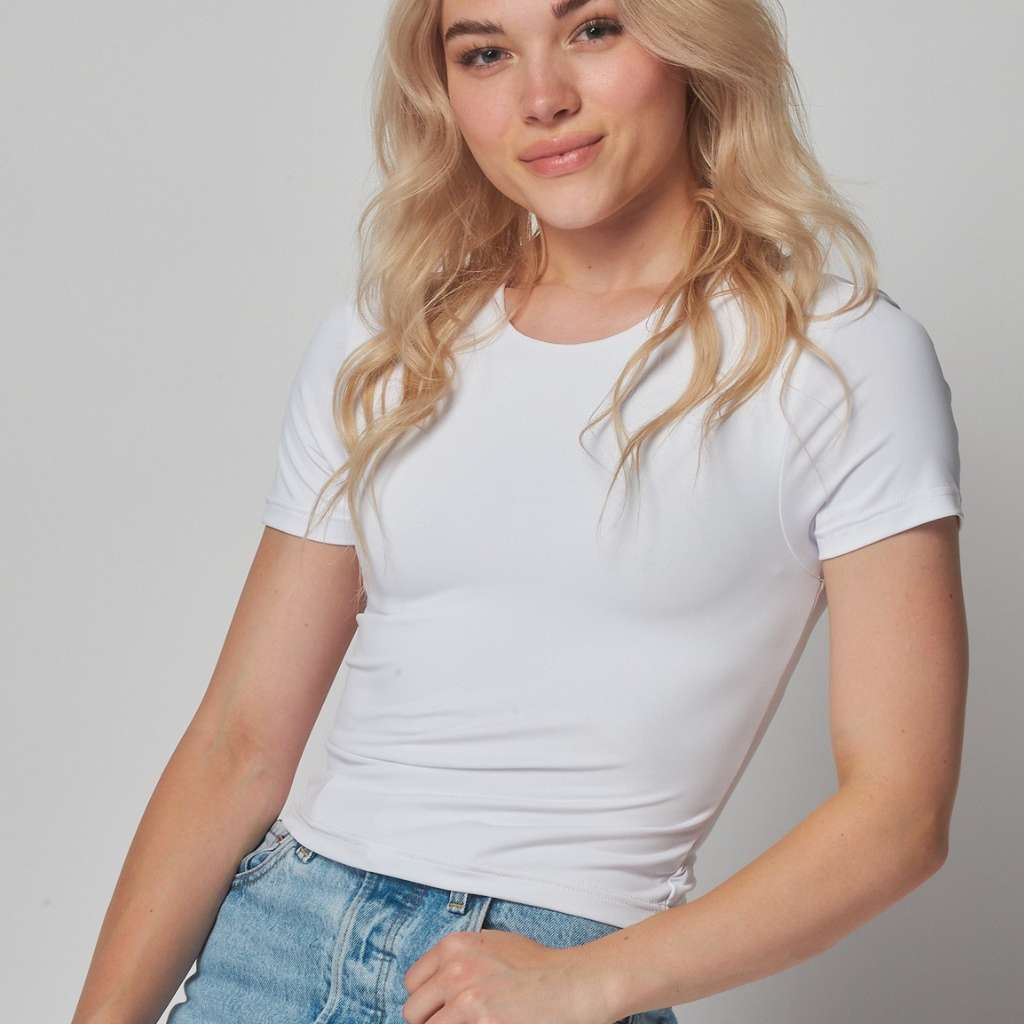 Close up of female wearing a crew neck double layer crop top in white - DSY Lifestyle