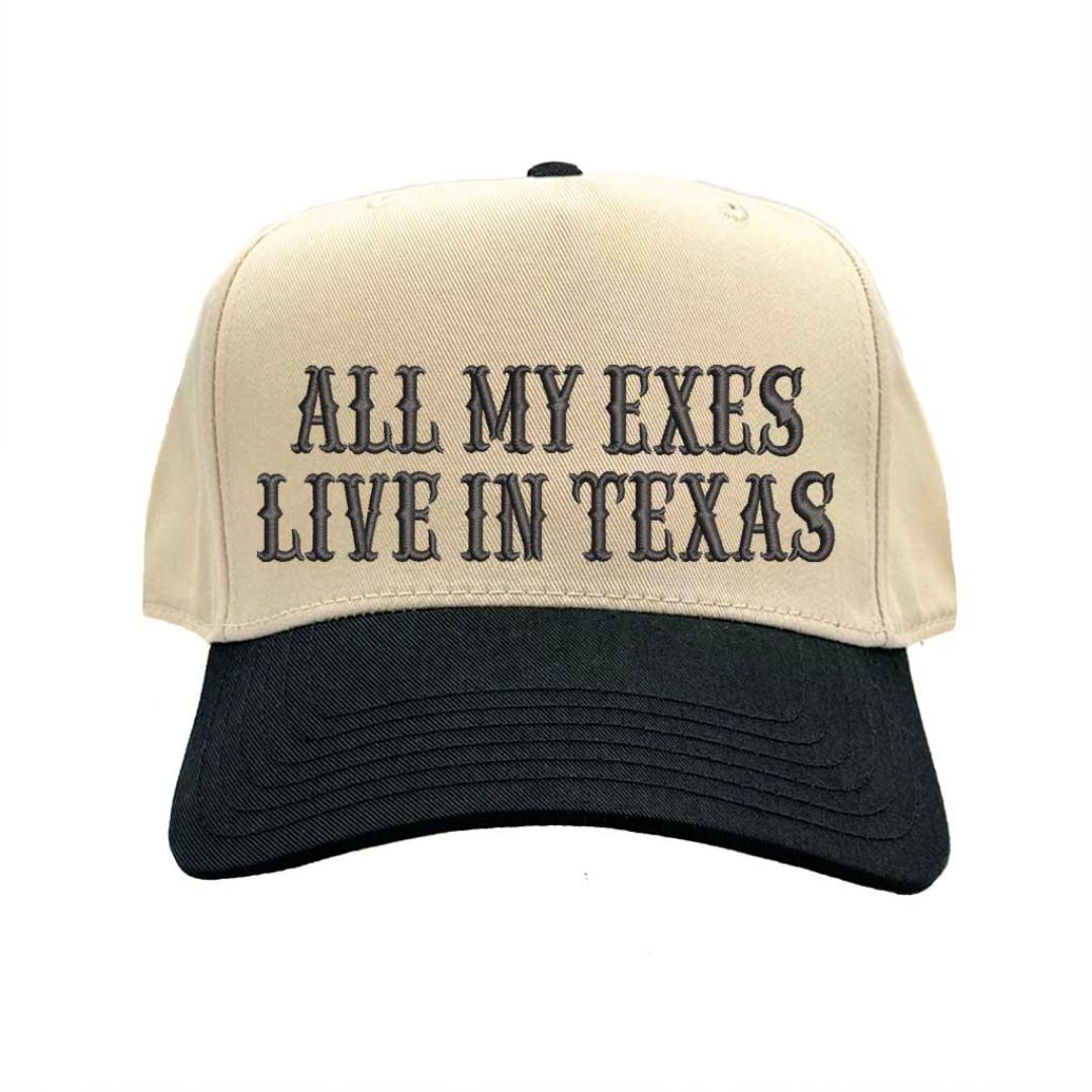Natural Black Two-tone embroidered baseball hat reading “All My Exes Live in Texas,” styled on a country-inspired outfit with boots and denim for a playful retro look - DSY Lifestyle