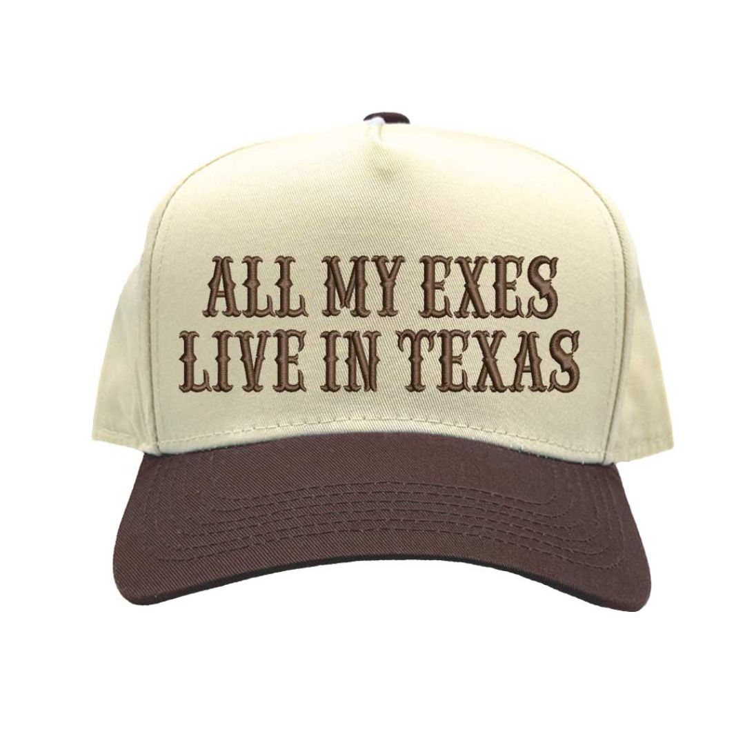 Natural Brown Two-tone embroidered baseball hat reading “All My Exes Live in Texas,” styled on a country-inspired outfit with boots and denim for a playful retro look - DSY Lifestyle