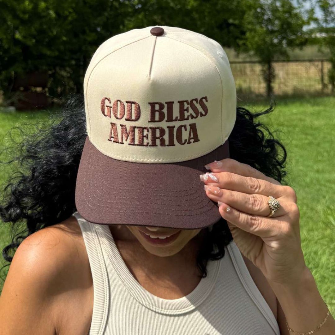 Natural Brown Two-tone 5-panel baseball hat with "God Bless America" embroidered on the front, structured crown and snapback closure โ DSY Lifestyle