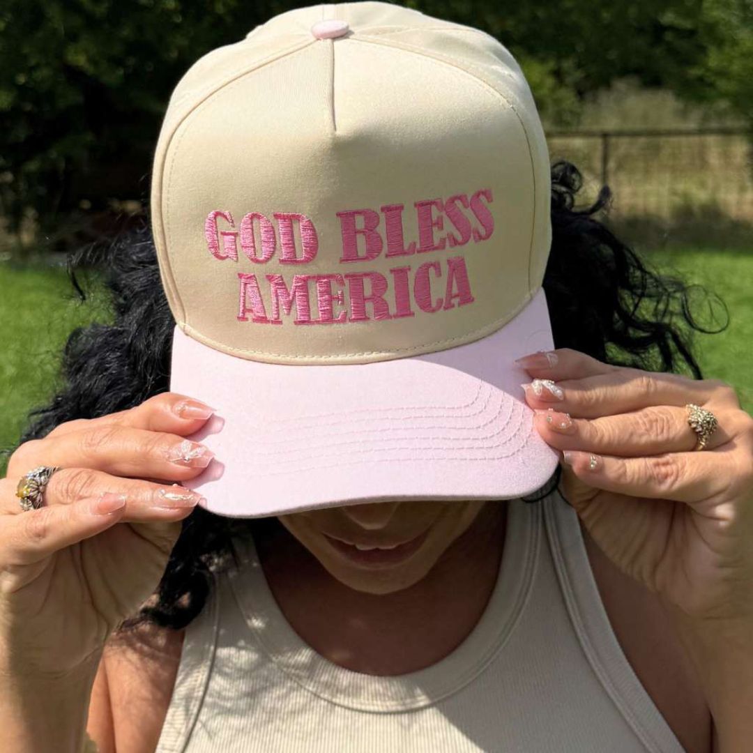 Natural Pink Two-tone 5-panel baseball hat with "God Bless America" embroidered on the front, structured crown and snapback closure โ DSY Lifestyle