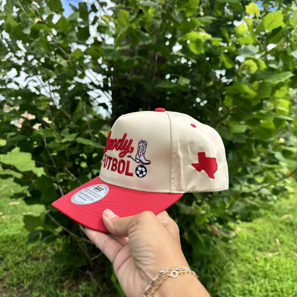 Howdy Futbol embroidered statement baseball hat in natural with red bill — DSY Lifestyle side view