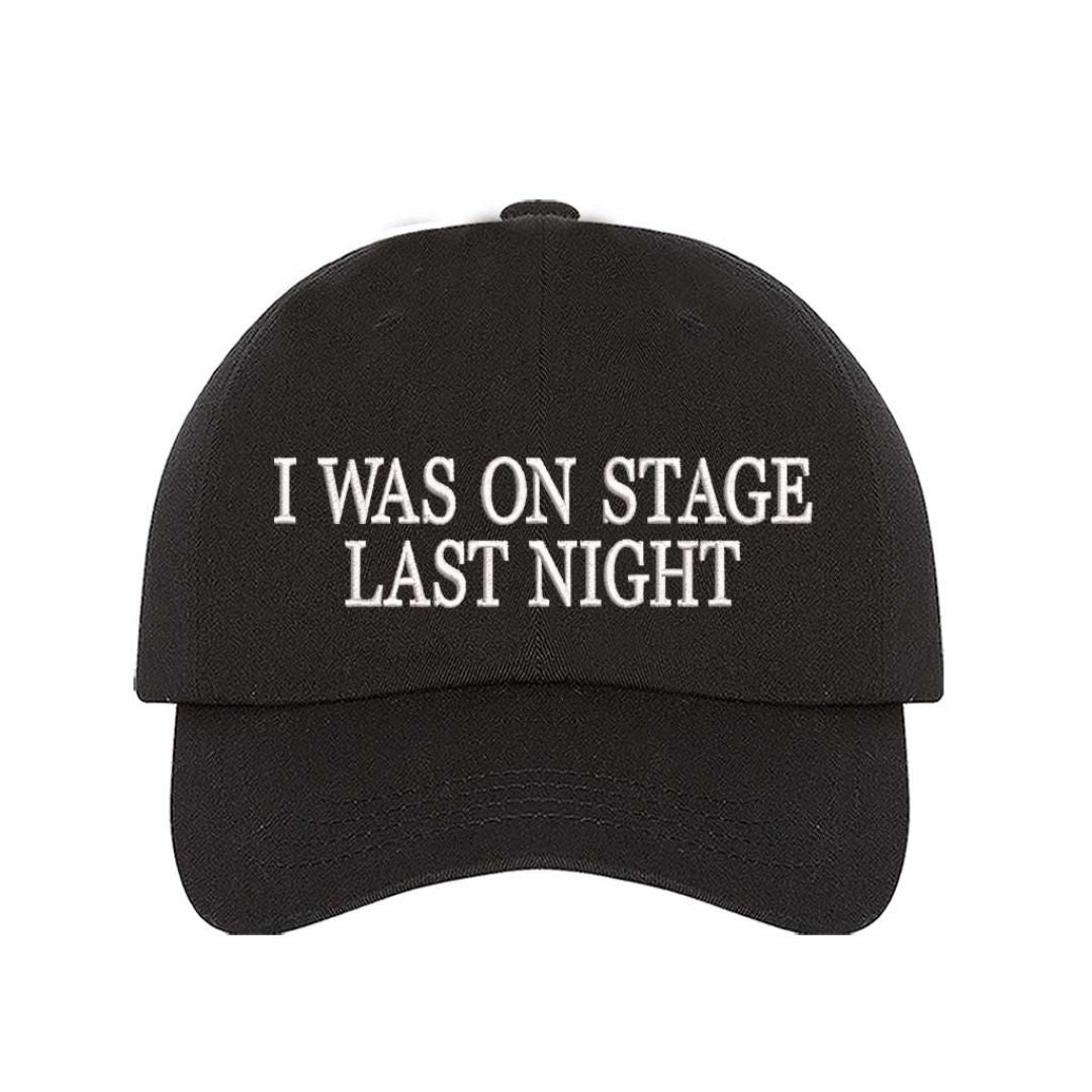 Black embroidered baseball hat with white text reading βI Was On Stage Last Nightβ β ideal for performers and creatives. - DSY Lifestyle