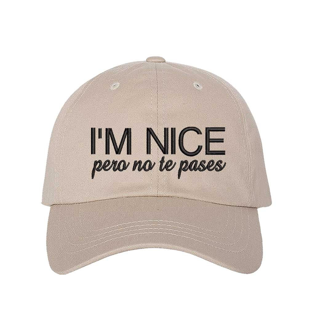 Stone I’m Nice Pero No Te Pases Embroidered Baseball Hat in soft cotton with curved brim and hook and loop closure. DSY Lifestyle.
