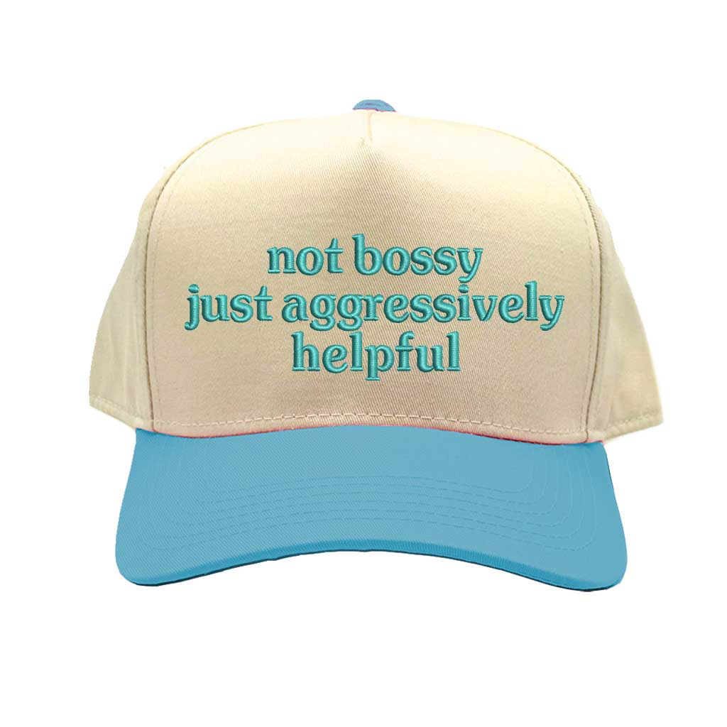 Natural Aqua Two-tone 5-panel embroidered baseball cap with the bold phrase “Not Bossy Just Aggressively Helpful,” ideal for confident women, leaders, and sassy streetwear lovers – DSY Lifestyle.