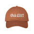 Texas Orange Oak Cliff Old English script Embroidered Baseball Hat in soft cotton with curved brim and adjustable hook and loop closure, designed for streetwear and everyday wear - DSY Lifestyle
