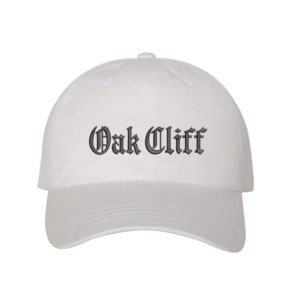 White Oak Cliff Old English script Embroidered Baseball Hat in soft cotton with curved brim and adjustable hook and loop closure, designed for streetwear and everyday wear - DSY Lifestyle
