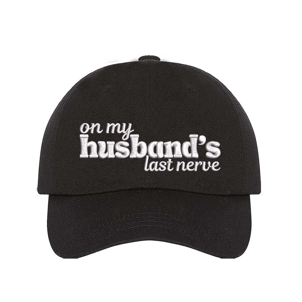 Black On My Husband’s Last Nerve Embroidered Baseball Hat in cotton with curved brim and adjustable strap closure. DSY Lifestyle.