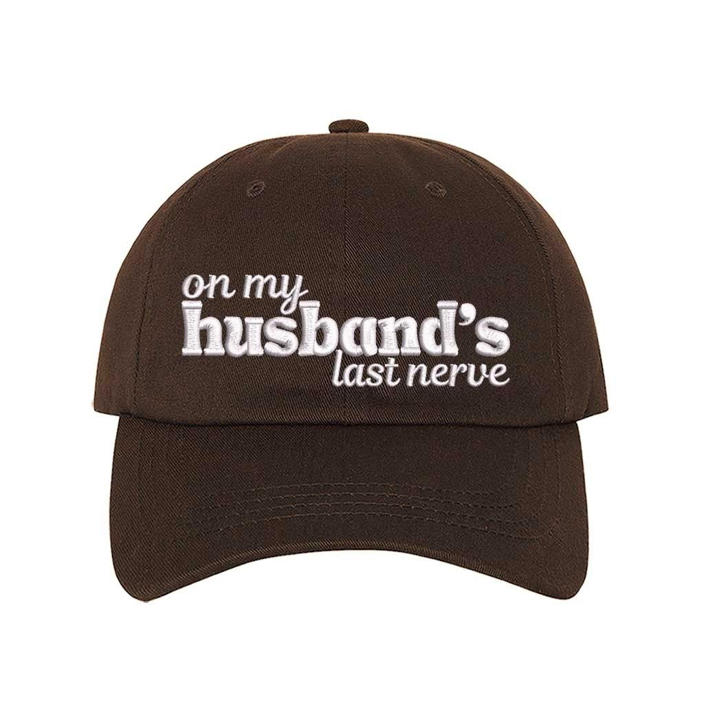 Brown On My Husband’s Last Nerve Embroidered Baseball Hat in cotton with curved brim and adjustable strap closure. DSY Lifestyle.