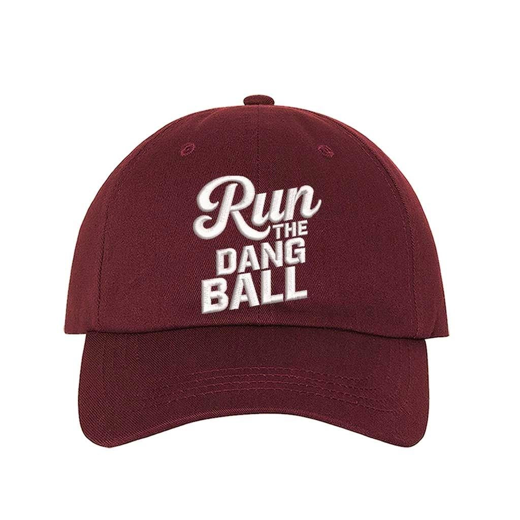 Burgundy embroidered baseball hat with Run the Dang Ball on front and hook and loop adjustable closure - DSY Lifestyle