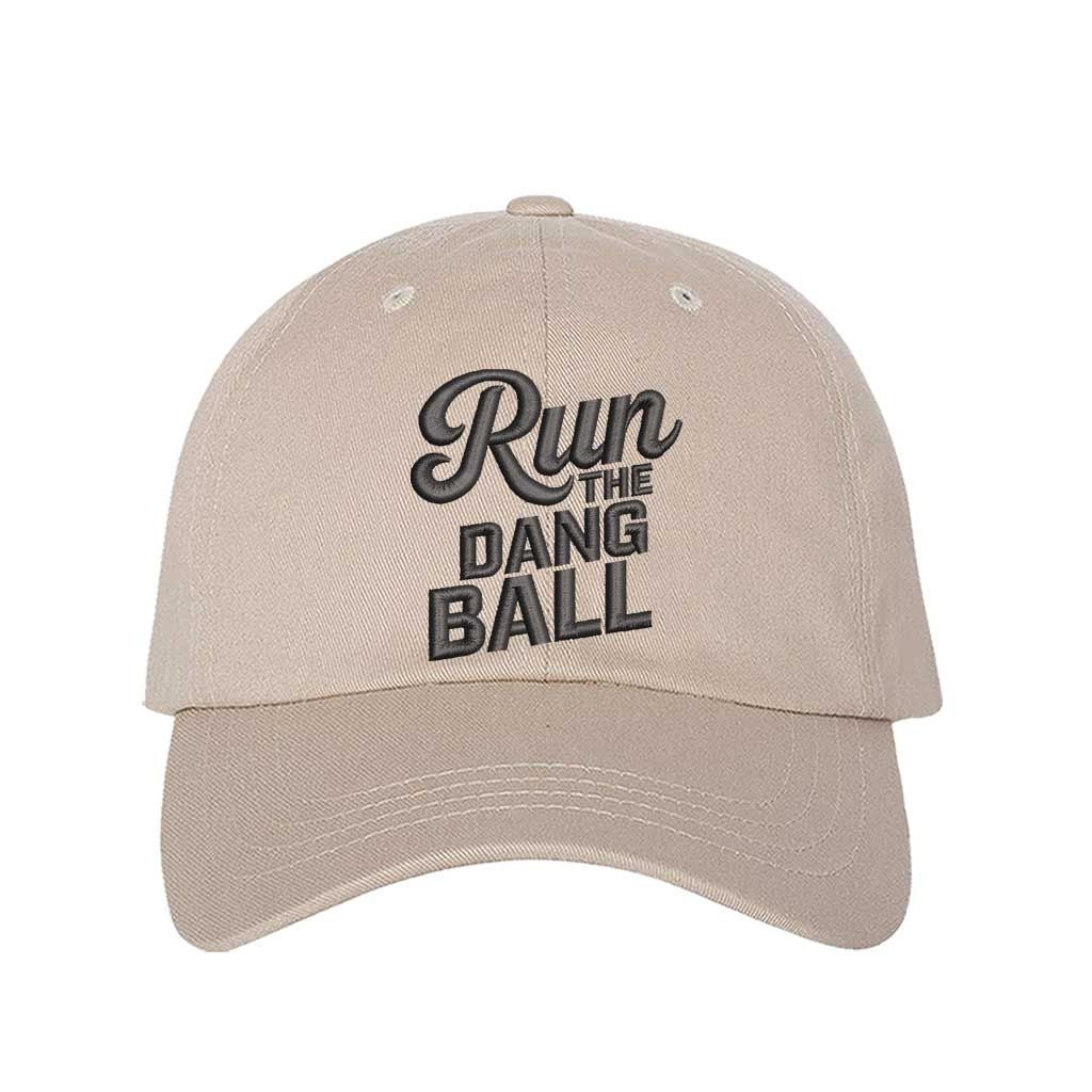 Stone embroidered baseball hat with Run the Dang Ball on front and hook and loop adjustable closure - DSY Lifestyle