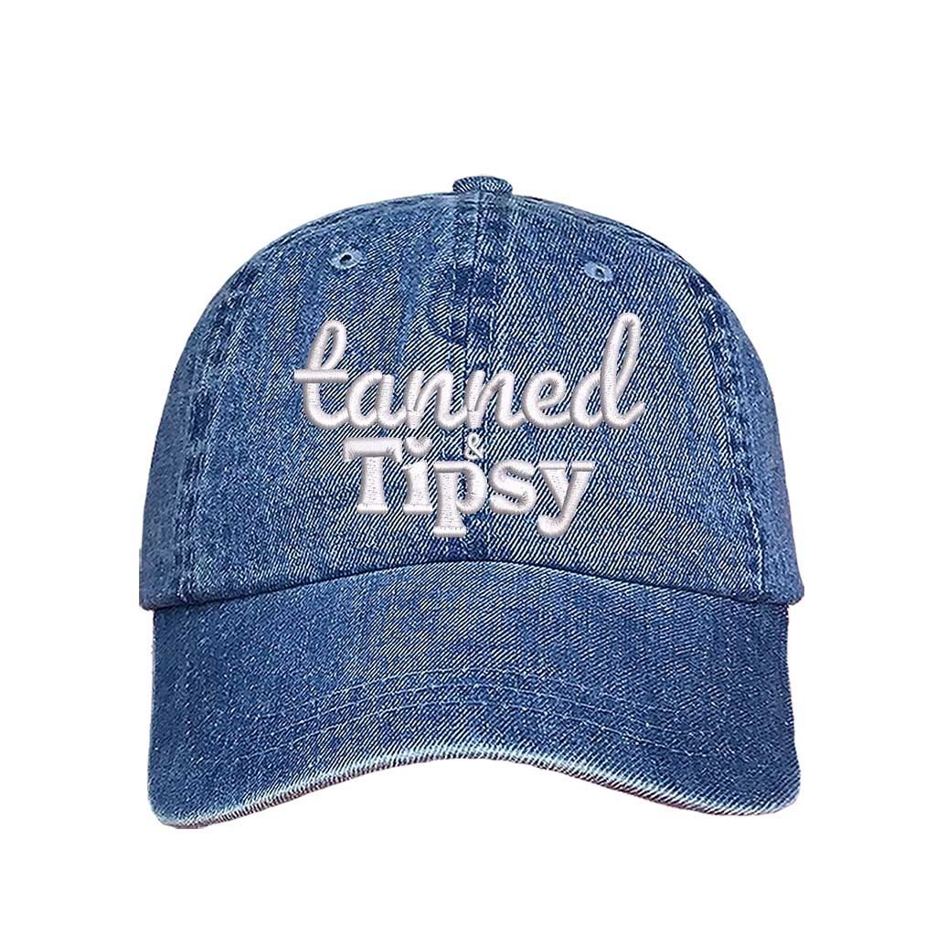 Light Denim Tanned and Tipsy Embroidered Baseball Hat in classic cotton with pre-curved brim and hook and loop closure, perfect for beach days and summer drinks. DSY Lifestyle.