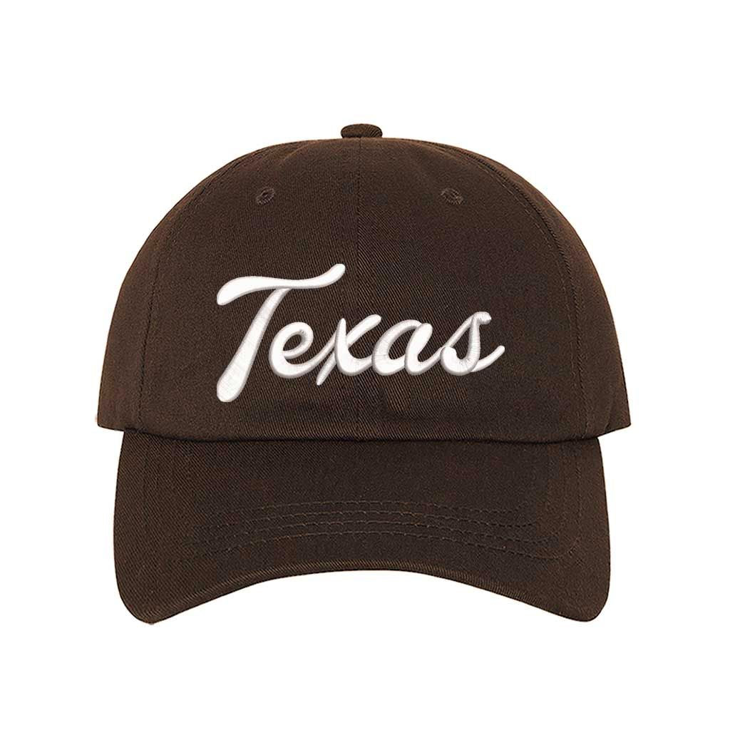 Brown Texas Script 3D Embroidered Baseball Hat with bold raised lettering, curved brim, and adjustable strap for a perfect fit. DSY Lifestyle.