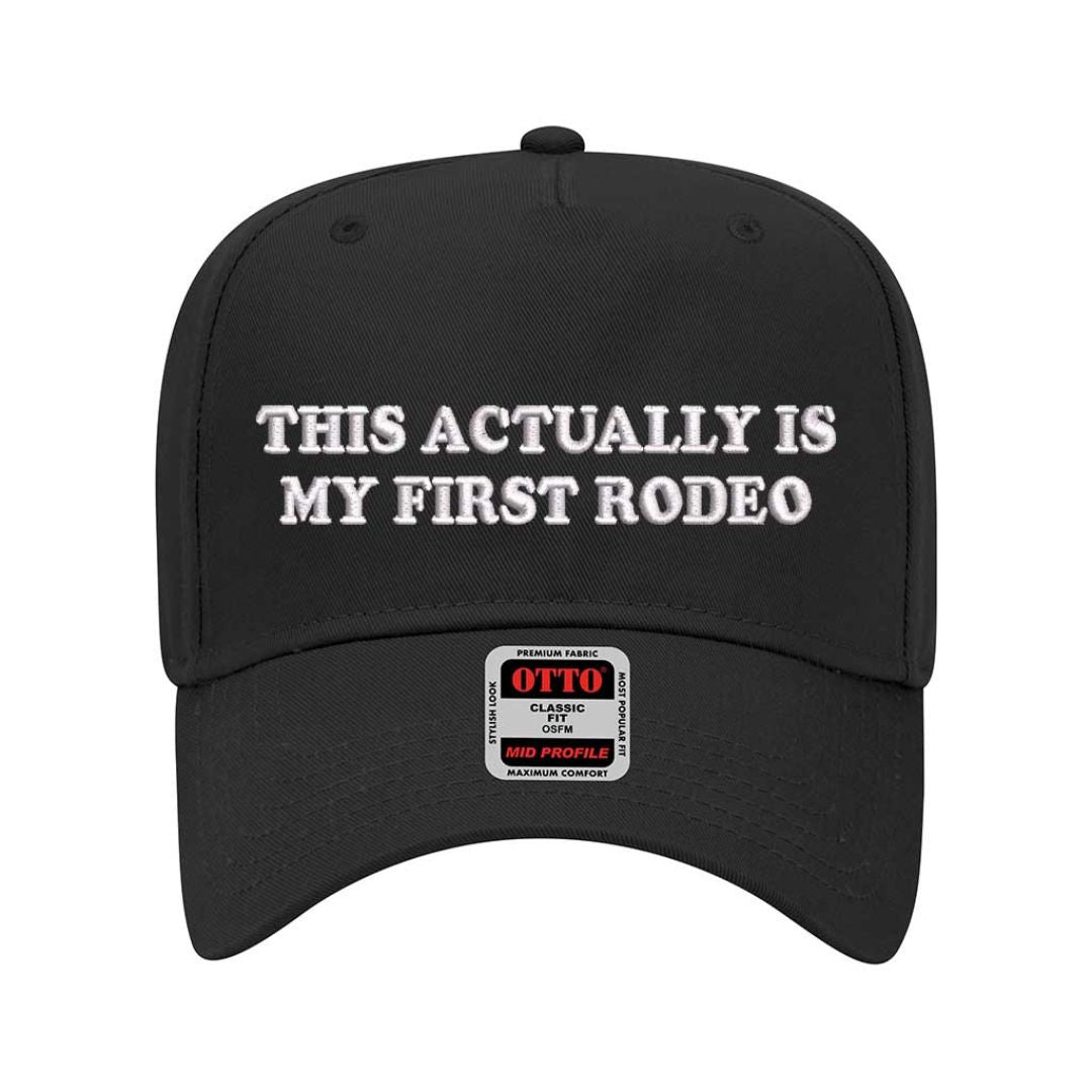 Solid Black embroidered hat that reads “This Actually Is My First Rodeo” in bold lettering; adjustable strap and curved bill; trendy unstructured cap for moms - DSY Lifestyle