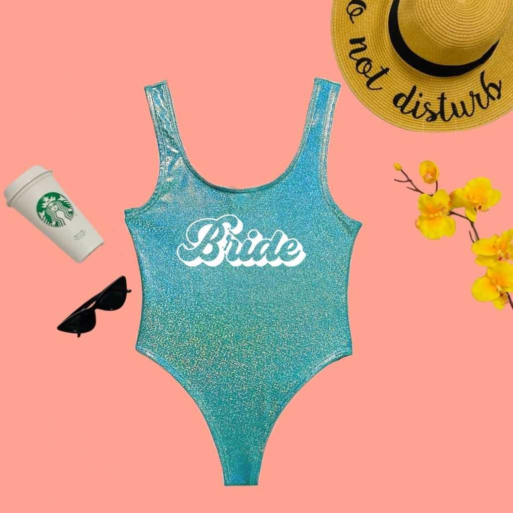 Flat lay of Bride Aqua Glitter One Piece Swimsuit - DSY Lifestyle