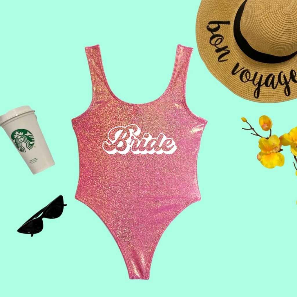 Flat lay of Bride Pink Glitter One Piece Swimsuit - DSY Lifestyle