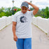 Male wearing a silver tshirt printed with Do what makes you happy - DSY Lifestyle