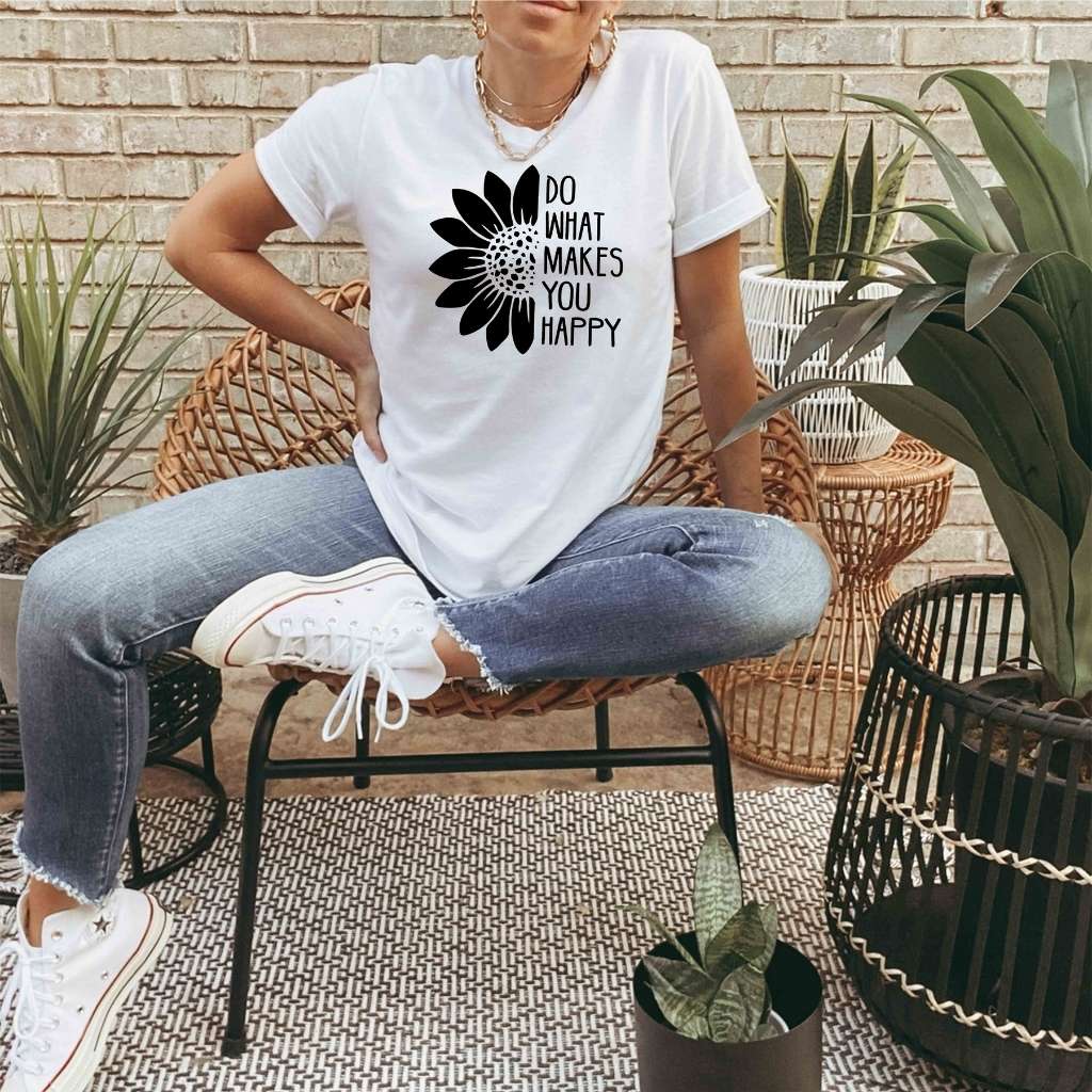 Female wearing a white tshirt printed with Do what makes you happy - DSY Lifestyle