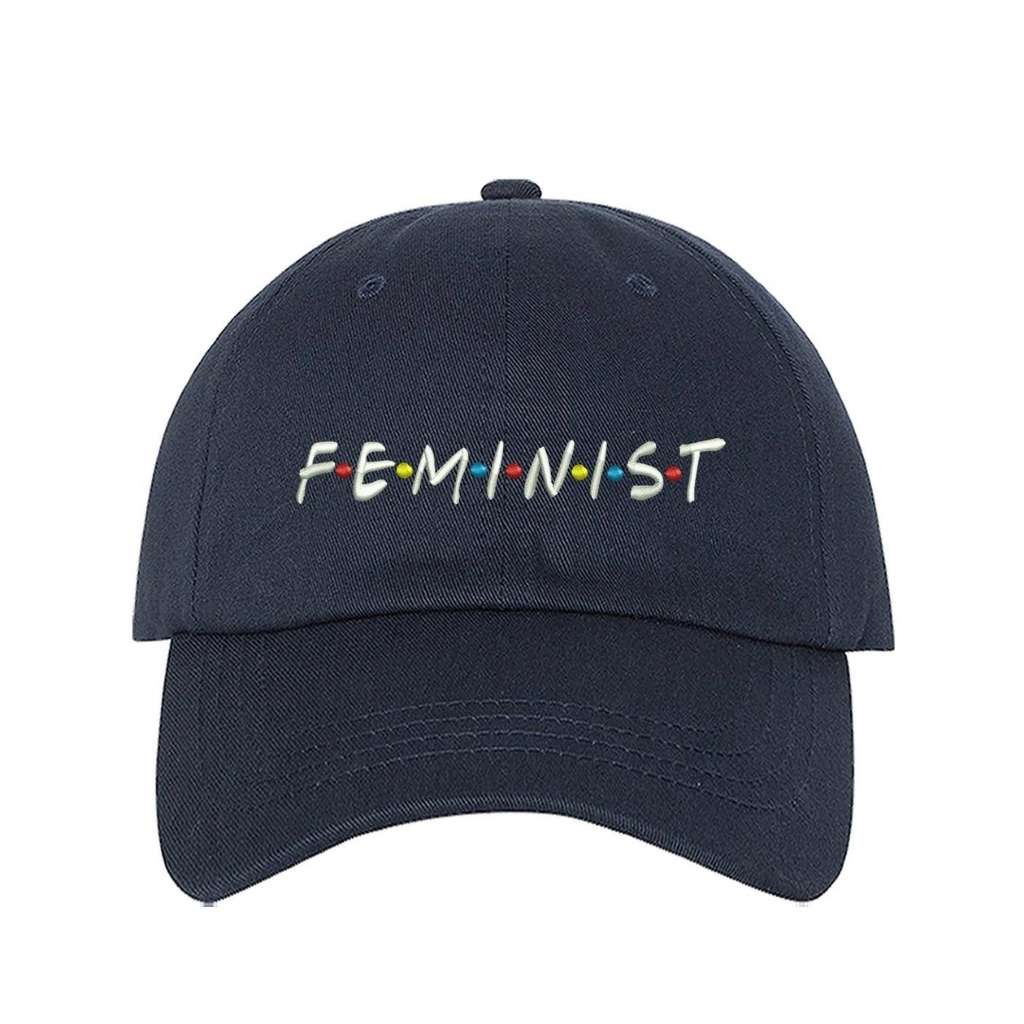 Navy blue baseball hat with FEMINIST embroidered in white with multicolored dots in between letters - DSY Lifestyle