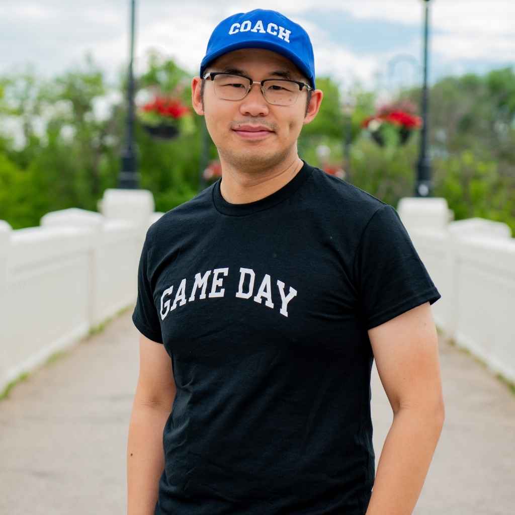 Male wearing a black t-shirt printed with Game Day in white - DSY Lifestyle