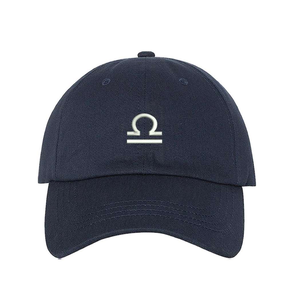 Navy blue baseball hat with Libra zodiac symbol embroidered in white - DSY Lifestyle